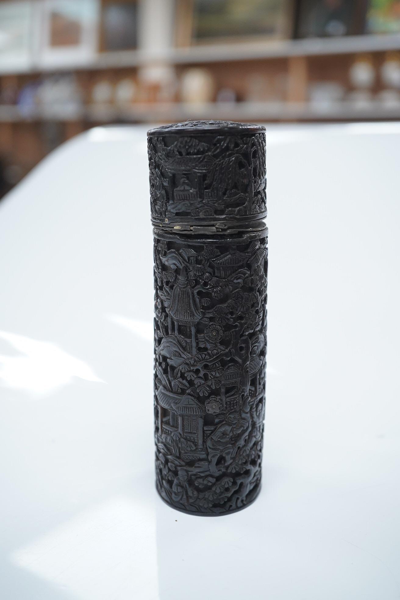 An early 19th century Chinese export carved tortoiseshell ovular box, with inscribed plaque to the lid, 13cm high. Condition - lid broken